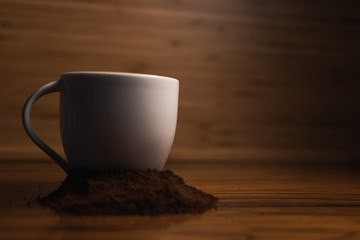 cup of coffee on wooden table