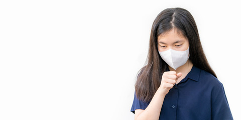 Young Asian woman coughing while wearing N95 mask