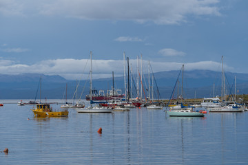 Fototapeta na wymiar Sailboats in harbor in Ushuaia, Argentina