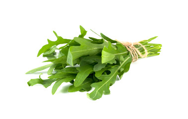 bunch of fresh arugula isolated on white background