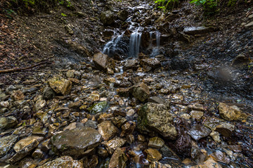 Beautiful streams and small waterfalls on the Eibsee at the Zugspitze