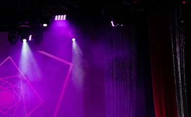 scene, stage light with colored spotlights and smoke