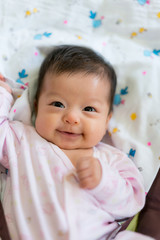 Cue Asian baby close up