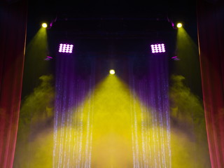 scene, stage light with colored spotlights and smoke