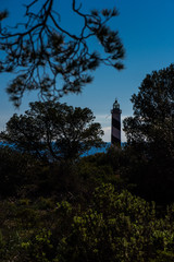 a lighthouse on the shoreline of mallorca, the spanish Island in the meditereanen sea 