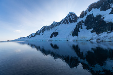 Fototapeta na wymiar Reflection of landscape in ocean, Antarctica Landscape