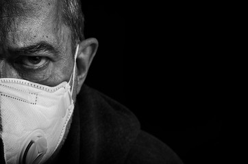 Elderly man in a protective mask