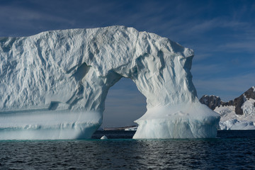 Arch in Ice Berg in Antarctica