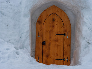 Wooden Door at Igloo House during ice cold winter