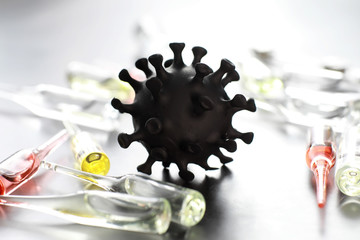 Worldwide pneumonia pandemic. The virus from China. Coronovirus molecule printed model on a 3D printer. Fatal disease.