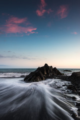 Waves on beach at coastline of Madeira