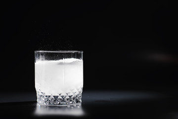 Water soluble tablets. The medicine is soluble. Anti-hangover. Effervescent tablets in a glass.