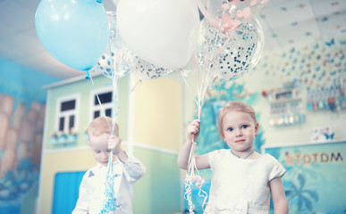 A small child is playing with toy