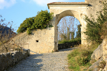 Fototapeta na wymiar Finalborgo (SV), Italy - December 12, 2017: The patway to Finalborgo castle, Finale Ligure, Liguria, Italy