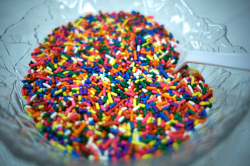Fototapeta na wymiar Candy sprinkles topping in a bowl