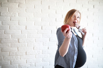 Pregnant young beautiful girl on the ninth month