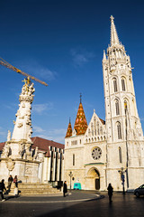 Fototapeta na wymiar The Matthias Church is a Roman Catholic church located in the Holy Trinity Square, in front of the Fisherman's Bastion at the heart of Buda's Castle District.