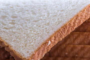 breakfast White bread slices closeup macro view background