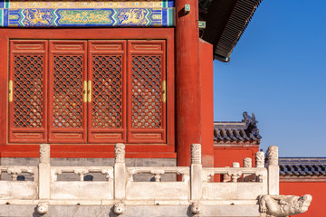 Red wooden window,, decoration colorful painting beam and wood pole from ancient china palace in...