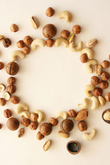 Nuts on black background, top view with copyspace. Assorted mixed nuts   on white table.