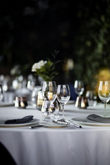 Beautiful table set for an event party or wedding reception . restaurant interior