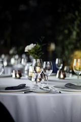 Beautiful table set for an event party or wedding reception . restaurant interior