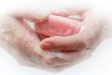 Antibacterial soap in the hands. Hand disinfection with soap. Cleanliness and hygiene in everyday life. Hand hygiene