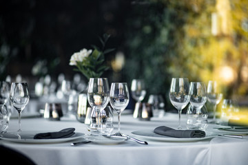 Beautiful table set for an event party or wedding reception . restaurant interior