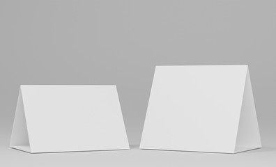 Naklejka premium Promotional table talker isolated on white background, mockup template paper tri-fold vertical triangle cards with reflections. white sheets front & left and right view. 3d render