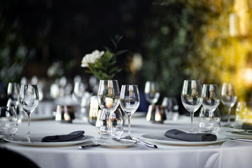 Beautiful table set for an event party or wedding reception . restaurant interior