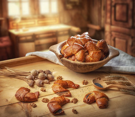 Breakfast poppy cakes on the breadboard with poppy seeds, sweet baked dessert in rustic style
