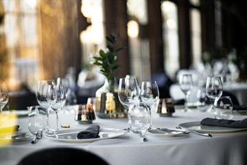 Beautiful table set for an event party or wedding reception . restaurant interior