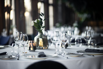 Beautiful table set for an event party or wedding reception . restaurant interior