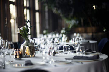 Beautiful table set for an event party or wedding reception . restaurant interior