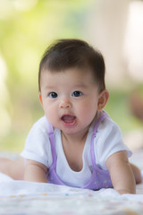 Cute asian baby happy and smile close up.