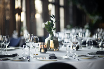 Beautiful table set for an event party or wedding reception . restaurant interior