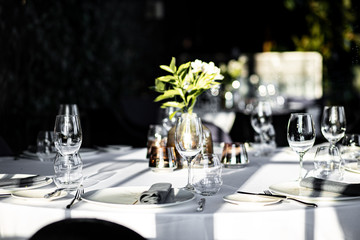 Beautiful table set for an event party or wedding reception . restaurant interior