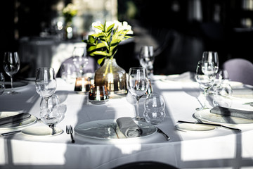 Beautiful table set for an event party or wedding reception . restaurant interior