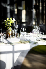 Beautiful table set for an event party or wedding reception . restaurant interior