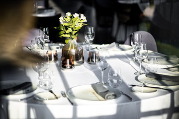 Beautiful table set for an event party or wedding reception . restaurant interior