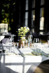 Beautiful table set for an event party or wedding reception . restaurant interior