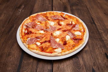 classic Italian pizza on a wooden table