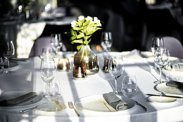 Beautiful table set for an event party or wedding reception . restaurant interior