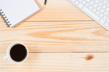 top view office work space with black coffee and PC