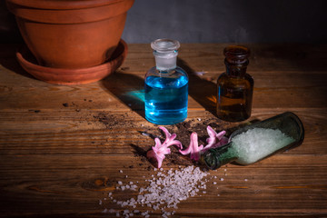Witchcraft potions on a wooden table