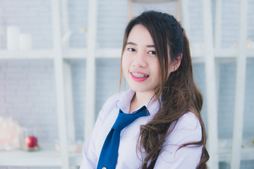 School uniform girl in a coffee shop