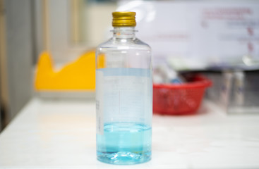 alcohol 70% on  blur background with protected coronavirus.