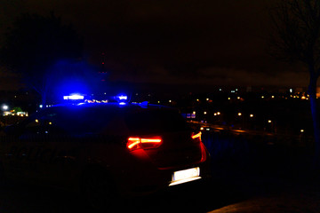police car controlling the entrance to the city by the coronavirus
