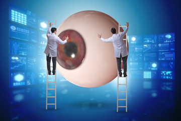 Doctor examining giant eye in medical concept