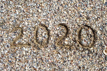 shells texture inscription 2020 on the beach